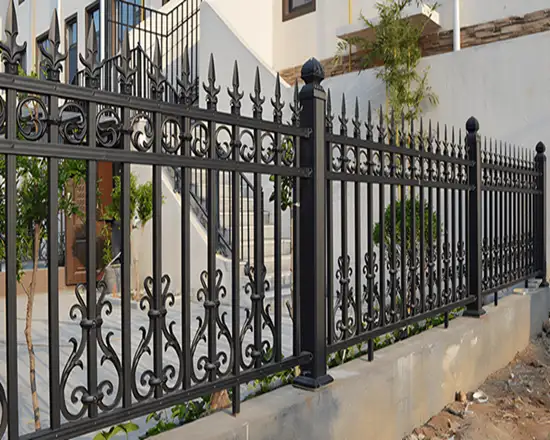 Ornamental spearhead fence for added protection.